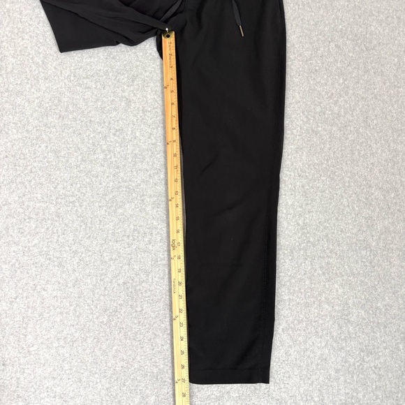 Lululemon On The Fly Pant Woven Womens 4 Black Travel Outdoor Casual W5AHOS READ - Picture 12 of 14